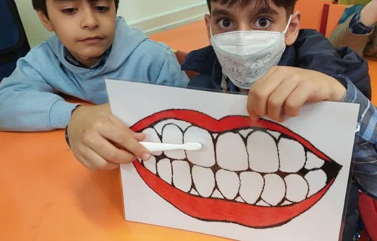 آموزش طریقه مسواک زدن و روز دندانپزشک پایه اول دبستان 10