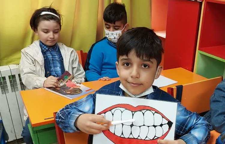 آموزش طریقه مسواک زدن و روز دندانپزشک پایه اول دبستان 4
