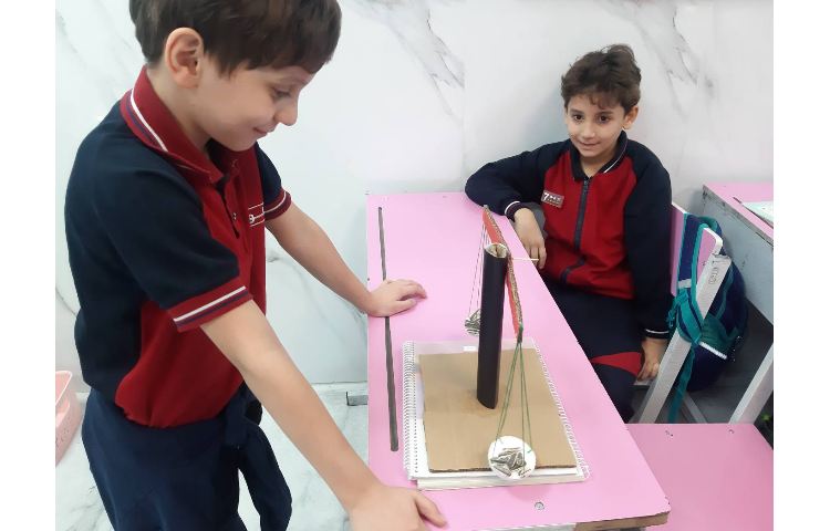 استفاده از ترازو برای مقایسه جرم اجسام 1