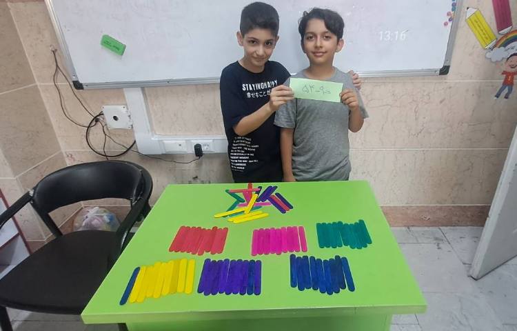 اموزش تقسیم همراه با دست ورزی جهت تفهیم بهتر