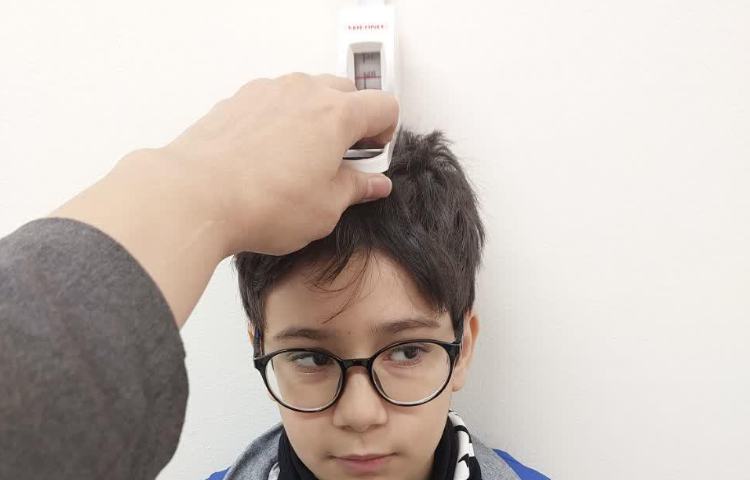 اندازه گیری قد و وزن دانش آموزان دبستان علوی