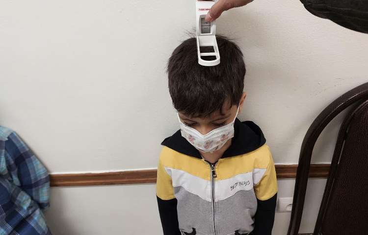 اندازه گیری قد و وزن دانش اموزان پیش و اول 3