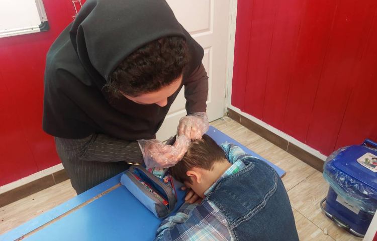 :بررسی پدیکلوز دی ماه دانش آموزان 1