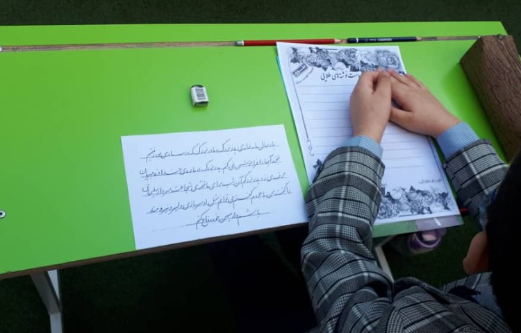 برگزاری مسابقه دست نوشته های طلایی بین دانش آموزان پایه اول 7