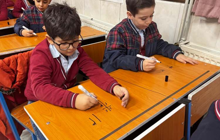 تمرین عددنویسی (10 تا 15) با شکل و جدول ارزش‌مکانی 2