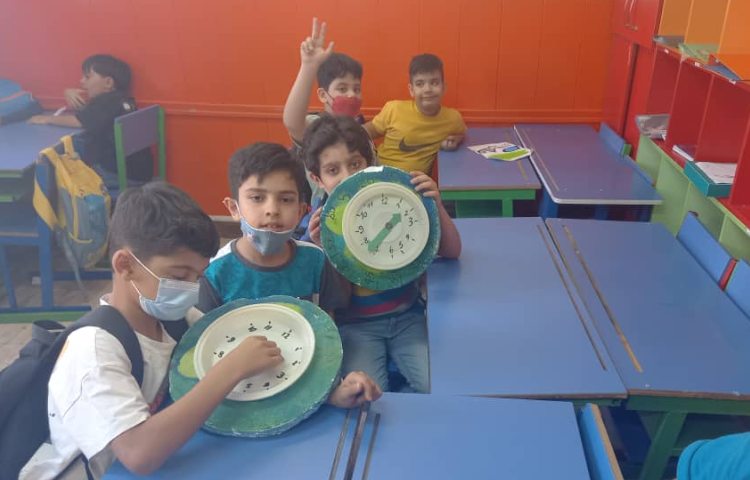 :دست ورزی گروهی(یادآوری مفهوم ربع و نیم در ساعت) 1