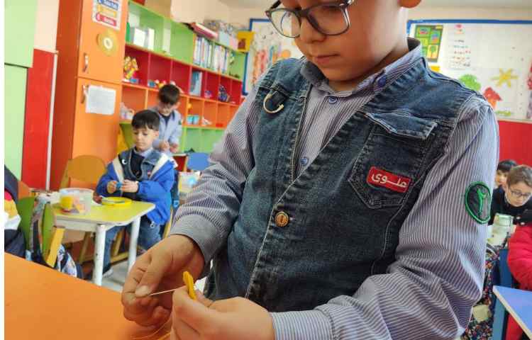 دوخت خورشید با نخ و نمد 3