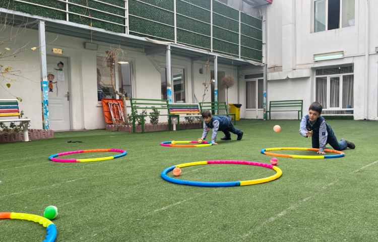 ریتم و گیم - کار با حلقه و توپ جهت تقویت عصب عضله و تعادل انجام شد 4