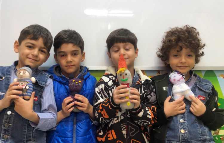 عروسک جورابی برای تثبیت نشانه ج