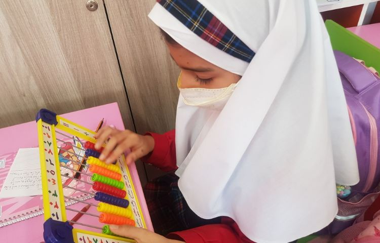 عکسmaths, practicing place values and using an abacus 2