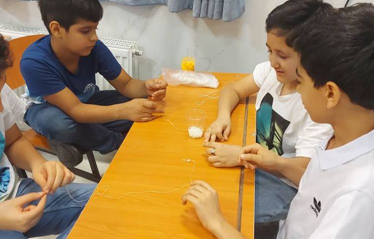 فعالیت ریاضی الگوها (ساخت الگوی مثلثی و مربعی با دست ورزی) 3