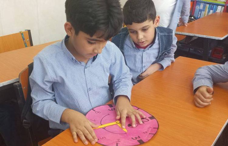 مبحث ساعت در کلاس Math 2