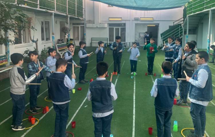 کار با چوبک و حلقه و کاپ جهت هناهنگی عصب عضله _عمل و عکس العمل 3