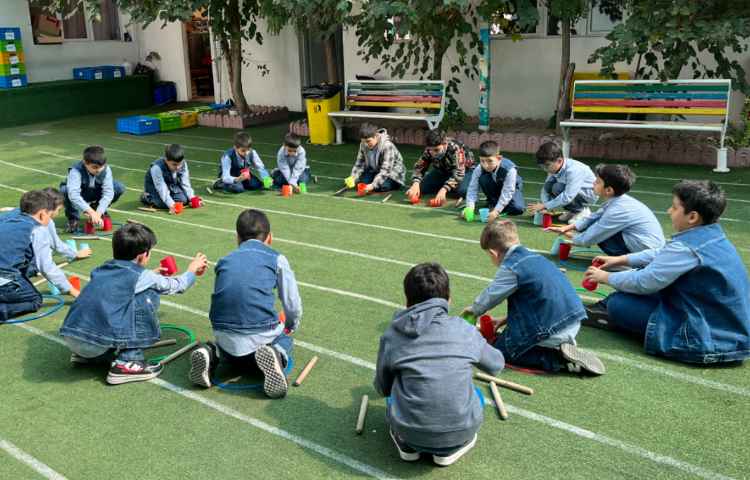 کار با چوبک و کاپ و حلقه برای هماهنگی عصب عضله_ عمل و عکس العمل